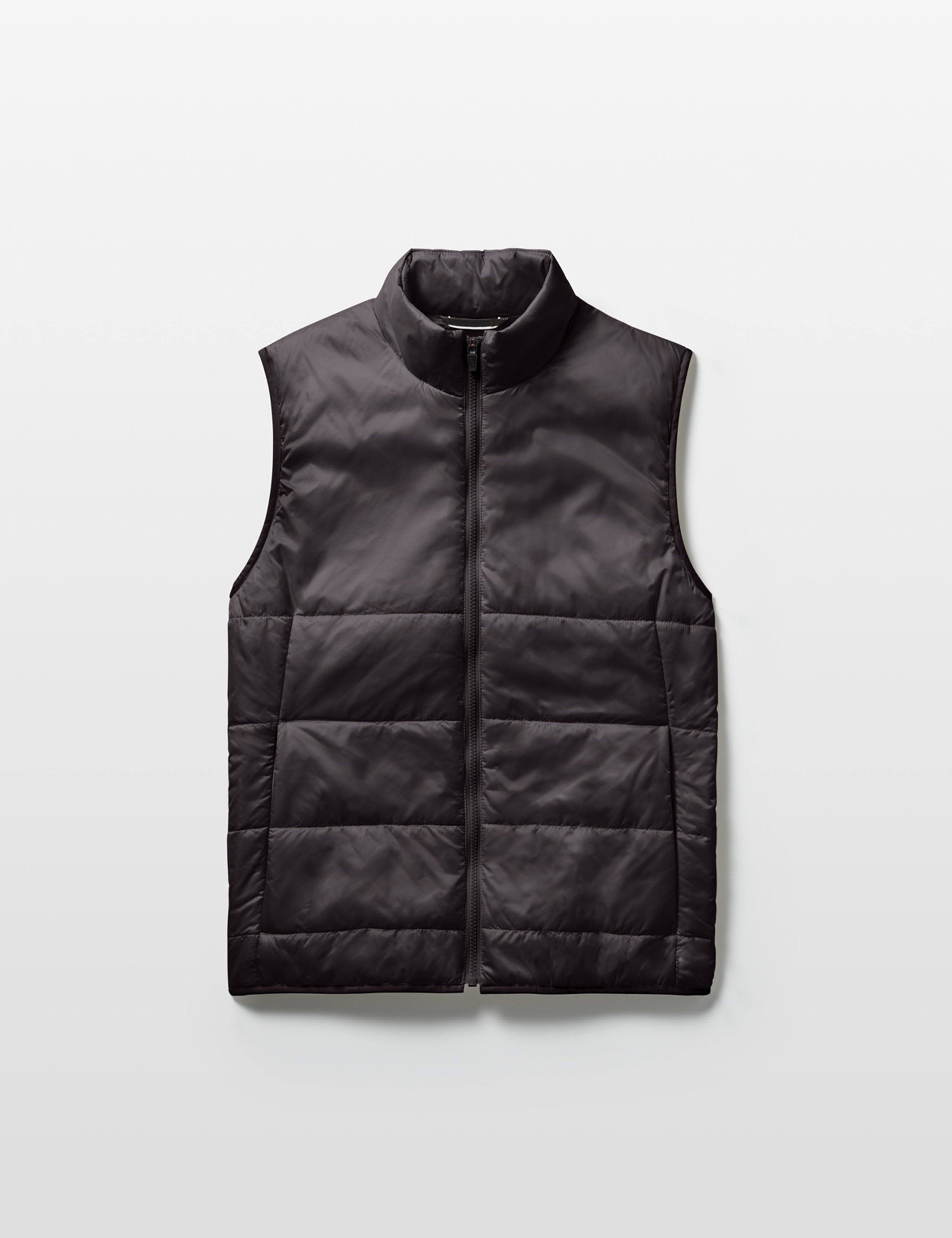 Flat lay of Eco Insulated Vest in Onyx Black from AETHER Apparel.
