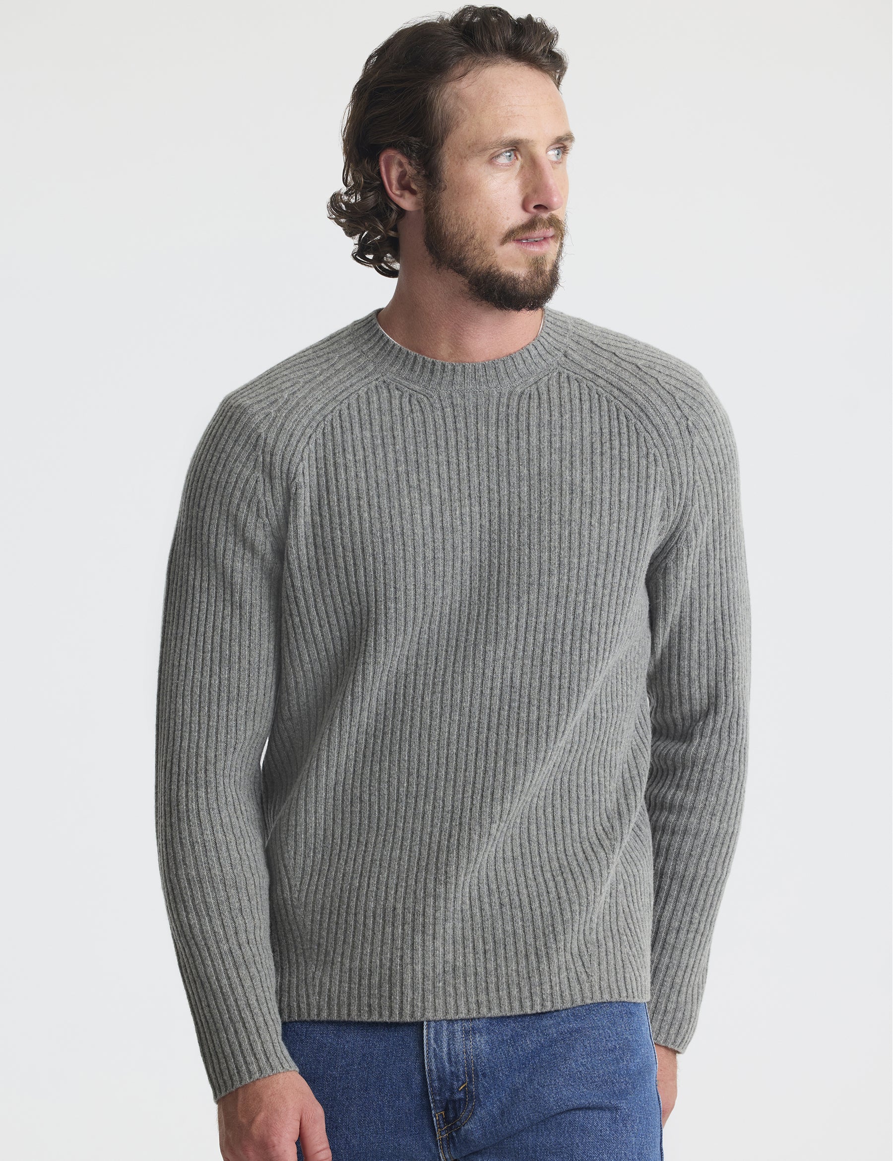 Front view of man wearing Lyon Sweater in Heather Grey from AETHER Apparel.