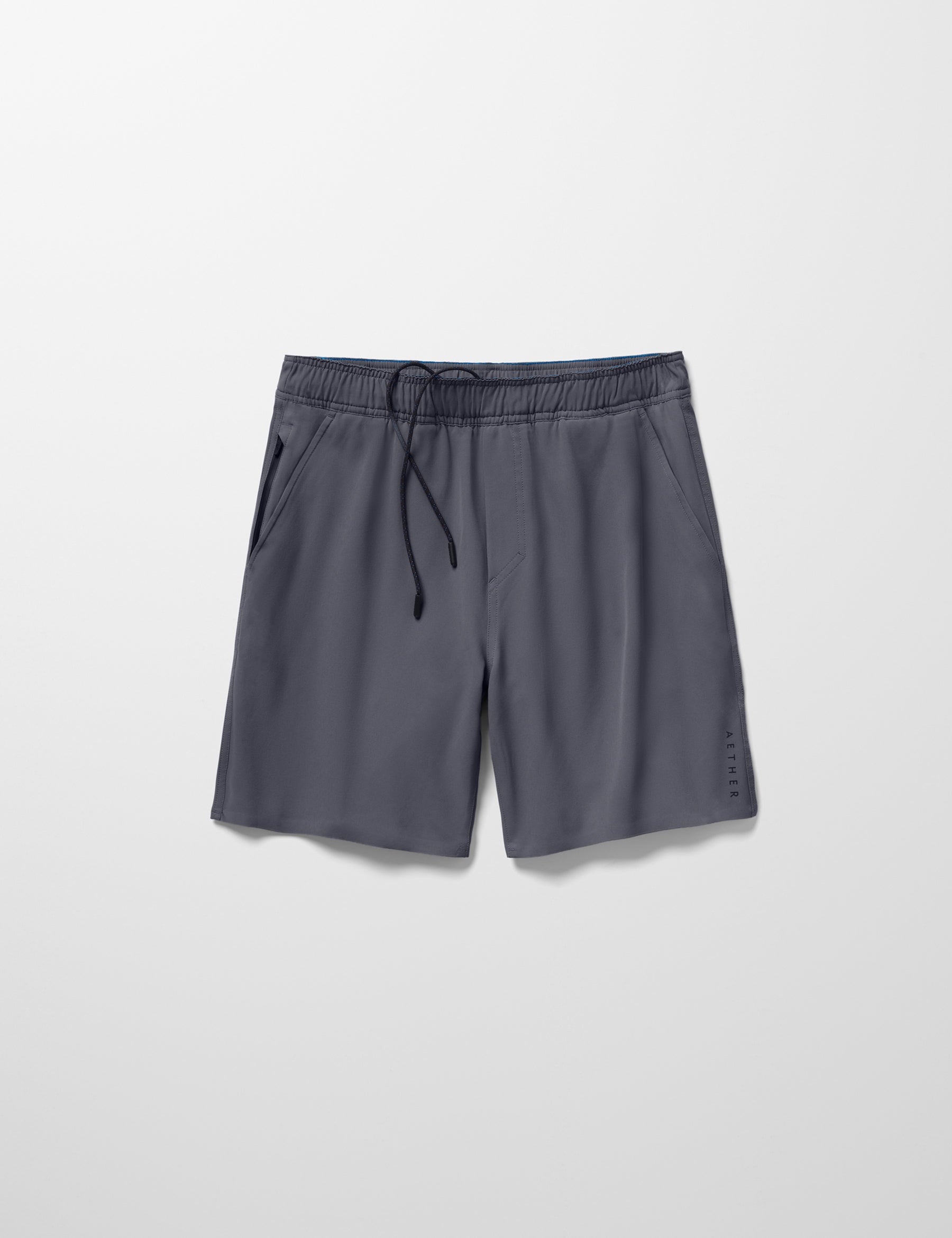 Flay lay image of Rogue Hybrid Short in Graphite from AETHER Apparel.